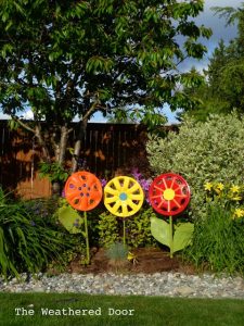 Colorful Upcycled Hubcap Flowers