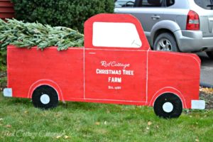 Large Red Christmas Truck With a Tree